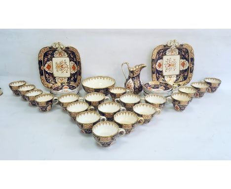 English porcelain Imari pattern part tea service of fluted form, 1820's, printed and painted in gilt with shaped panels, scro