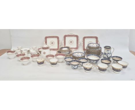 Paragon china part tea service with puce urn and scroll borders, six Royal Worcester china floral coffee cans and saucers, qu