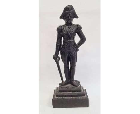Cast iron model of a military figure on stepped base, 41cm high