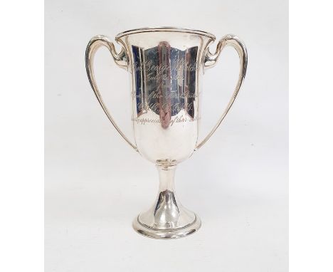 An early 20th century sterling silver two-handled trophy cup, inscribed 'Lt. Col. George W. Gatchell July 28, 1912 from offic