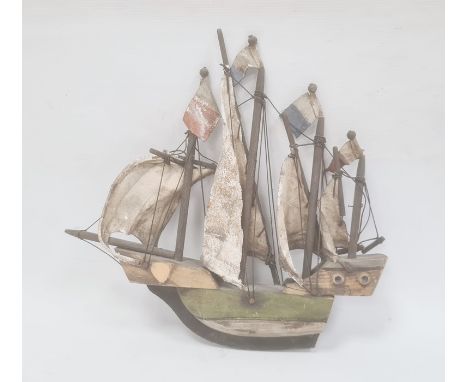 Painted and carved wooden naval model of a quadruple masted sailing galleon, 31cm high x 34cm wide