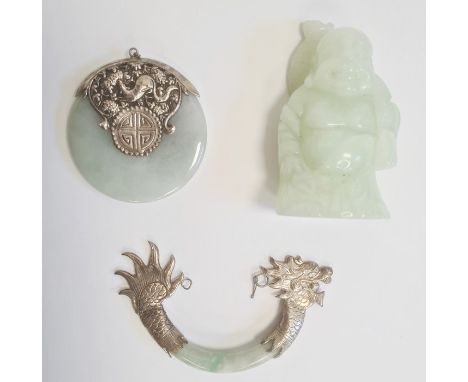 Chinese jade disc pendant, silver mounted, animal embossed, 5cm dia., Chinese silver mounted curved jade piece and a hardston