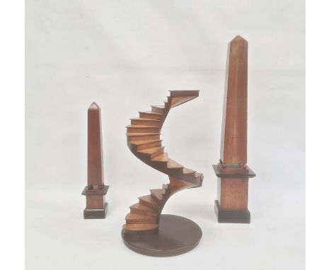 Architectural wooden model of spiral staircase, 36.5cm high and two various wooden obelisksCondition ReportLate 20th century,