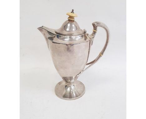 George V silver coffee pot with ivy finial and leaf relief decoration to handle, on circular base, London 1913, maker Edward 