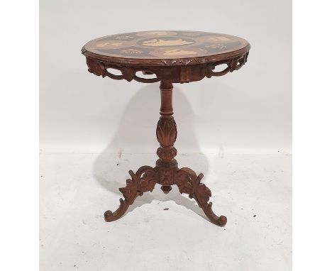African-style walnut and marquetry inlaid centre table, the top inset with various African and other animals and flowers, car