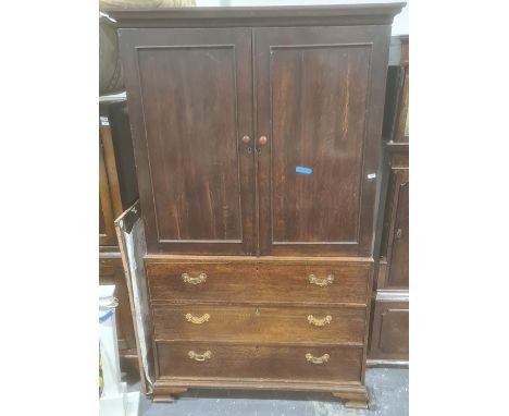 19th century oak linen press, moulded cornice with two cupboard doors enclosing open space (no shelf) above three drawers, og