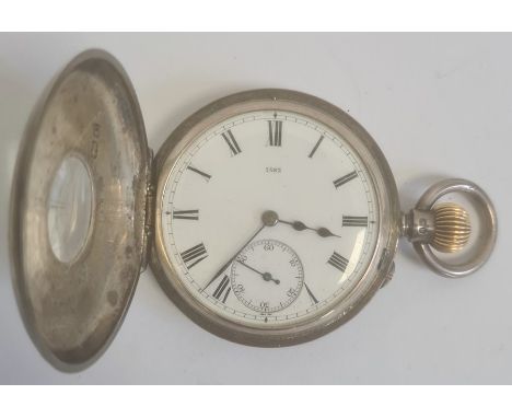 Silver half hunter pocket watch, the enamel dial with roman numerals and subsidiary seconds dial, inscribed '7582', the movem