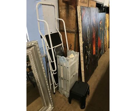 Three sets of ladders and a step
