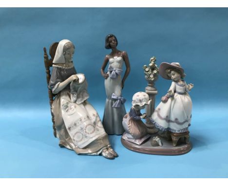 Two Lladro figures and one Nao figure (3)