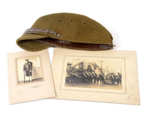 SECOND WORLD WAR - AN IMPERIAL JAPANESE COARSE WOOL CAP of regulation specification, the silk lining bearing printed maker's 