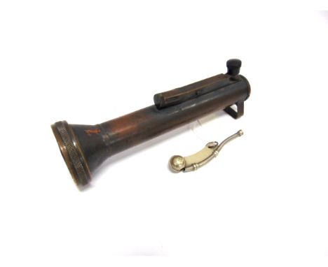 SECOND WORLD WAR  A British Naval Morse/Signal Torch of brass and copper construction, 25cm long together with boson's nickel