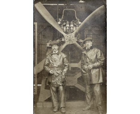 GREAT WAR AVIATION - A PHOTOGRAPHIC STUDY OF A FOUR BLADED AERO ENGINE ON TEST BEHIND TWO ENGINEERS  both clad in waterproofs