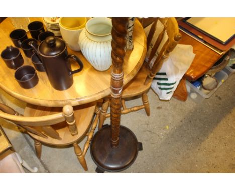 An oak barley twist standard lamp and shade