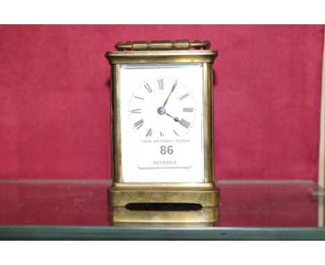A brass cased carriage clock