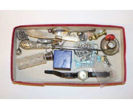 A tray containing a silver top scent bottle; a wrist watch; a silver handled button hook etc.