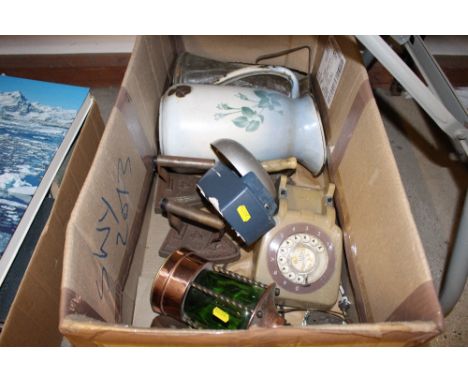 A box containing a telephone; a lantern; jugs; flat irons etc.