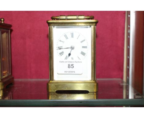 A brass cased carriage clock