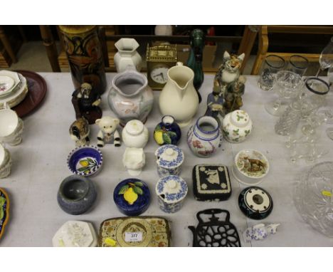 A Russian papier maché box and cover; mantel clock; various ornaments; Poole pottery vase etc. 