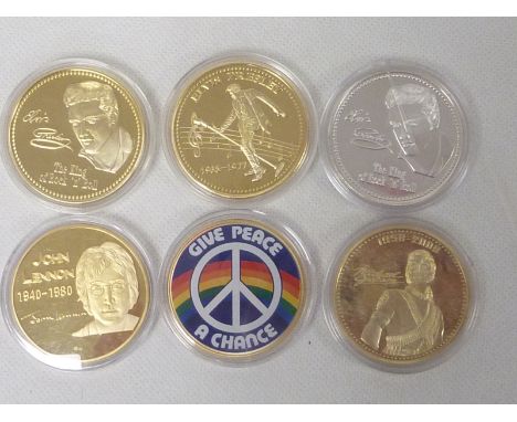 Thirteen commemorative coins / medallions including seven Elvis Presley, five John Lennon and one Michael Jackson, all except