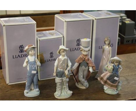 5 Various Lladro figurines with 4 boxes.