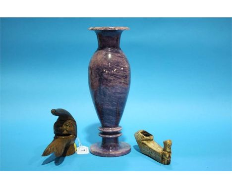 A South American opium pipe, a carved treen nut cracker etc.