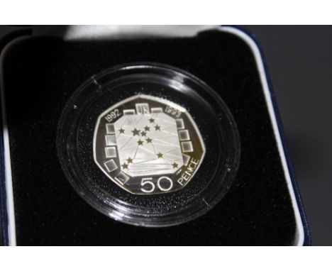 A ROYAL MINT 1992 - 1993 SILVER PROOF 50 PENCE COIN, with COA/Booklet, in original presentation case