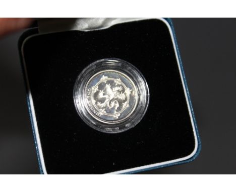 A ROYAL MINT 1999 SILVER PROOF £1 COIN, with COA/Booklet, in original presentation case