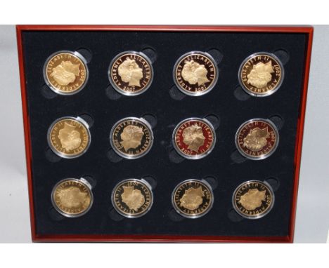 A ROYAL MINT 2007 SILVER PROOF 'HISTORY OF THE MONARCHY' TWELVE PIECE CROWN COIN SET, with COA/Booklet, together with a comme