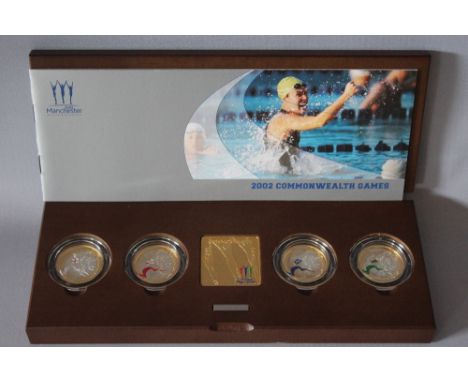 A ROYAL MINT 2002 'OFFICIAL COMMONWEALTH GAMES' SILVER PROOF PIEDFORT FOUR COIN SET, comprising four £2 coins, with COA/Bookl