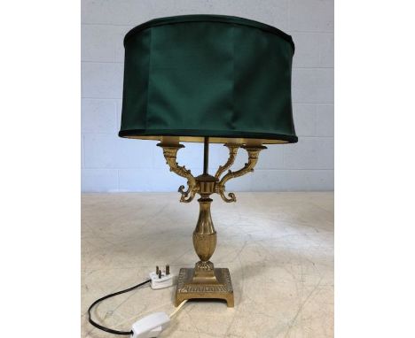 Brass table lamp with four branches and green shade, overall height approx 55cm