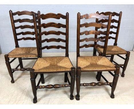 Set of four ladder-back rush-seated dining chairs