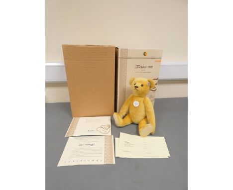 Steiff. 1908 Replica Teddy Bear, 2006, white tag 406751, in yellow mohair with growler. Complete with certificate and box, 13