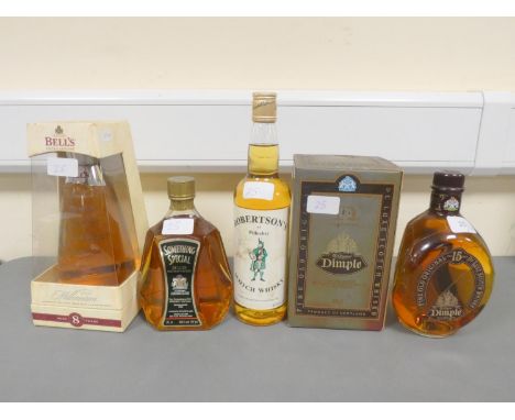 Four bottles of Blended Scotch Whisky, Dimple 15 years old De Luxe, 75cl, 43% vol, boxed, Bell's Millennium 2000, 70cl, 40% v