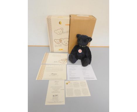 Steiff. Teddy Bear, 2007, white tag, dark blue mohair and tilt growler. Complete with certificate and box, 12.5"/32cm. Limite