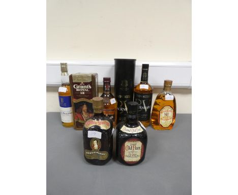 Six bottles of Blended Scotch Whisky, Old bottle of Grants Royal 12 years old, 750ml, 43% vol, In a Scottish Kings tin, Depic