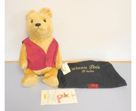Steiff. Winnie the Pooh Teddy Bear, 2004, white tag 680298, in yellow mohair with red waistcoat. Complete with dust bag and s