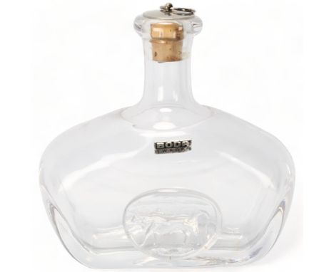 ERIK HOGLUND for Boda, a stoppered clear glass flask, with applied Bull seal, signed Boda, with original label, height 13cm G