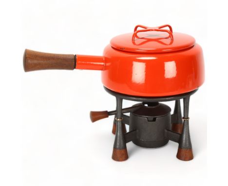 JENS QUISTGAARD for Dansk Design, a mid 20th century fondue set, with cast iron base and teak mountsSmall enamel chips to rim