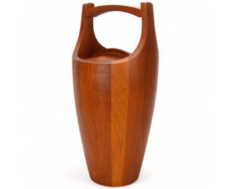 JENS QUISTGAARD for Dansk Designs, an early “Congo” large size ice bucket in staved teak with an orange waterproof liner, wit