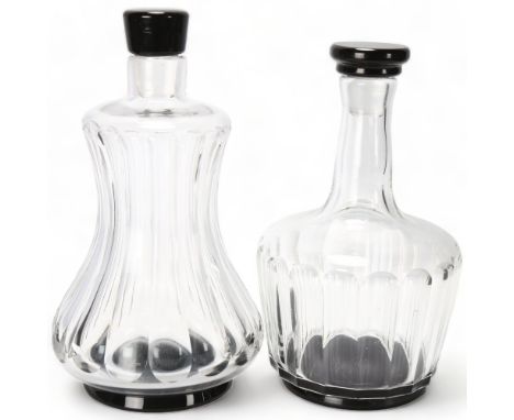 SIMON GATE for Orrefors, two fluted pattern decanters with black glass foot and stopper, 1920s/30s design, marked to base OF 