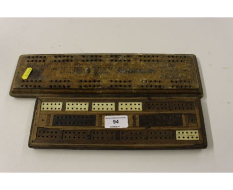 A Bluebell tobacco advertising cribbage board; and one other cribbage board