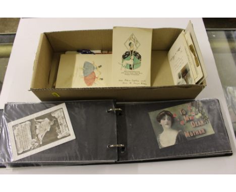 An album of early 1900's greetings post-cards and other cards 