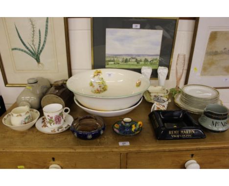 Two stoneware hot water bottles; a Royal Doulton ash tray; a Royal Worcester floral decorated tea cup and saucer; an Art Glas