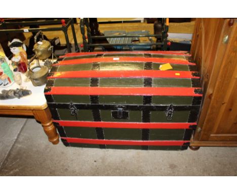 A painted wooden bound dome topped trunk