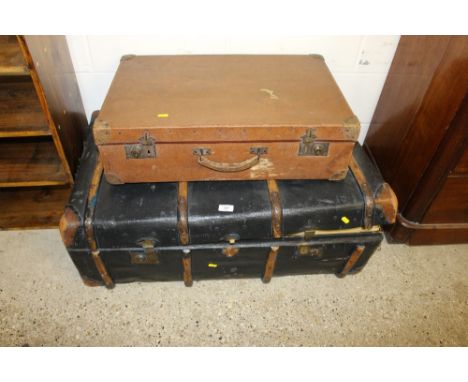 A brown leather suitcase; together with a large travelling trunk and contents of toys and books 