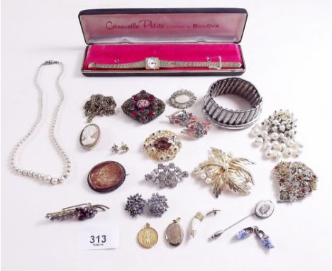 A vintage ladies Caravelle wrist watch and various costume jewellery 