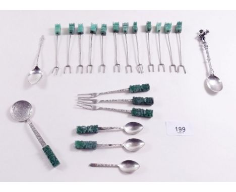 A quantity of silver tea spoons with 'jade' handles and other silver spoons 