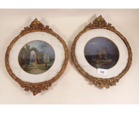 A pair of circular oil and mother of pearl pictures - ruins in moonlight, in gilt frames, 14cm diameter