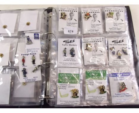 A folder of approximately eighty police charity enamel badges and helmet plate badges - all on original card mounts 