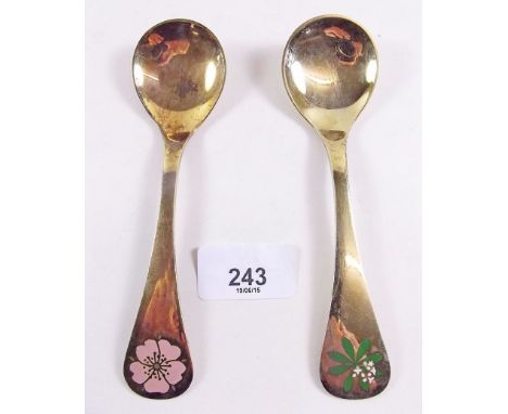 Two Georg Jenson, silver gilt and enamel, Year spoons, 1975 and 1976